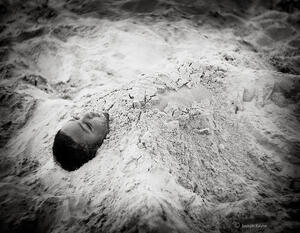 Boy In Sand