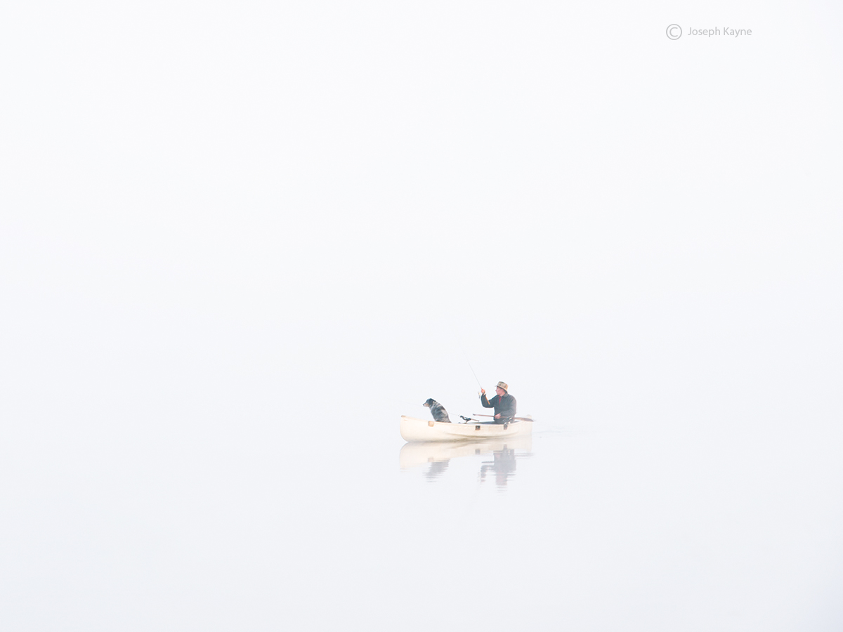 A Lone Fisherman &amp; His Dog Canoeing In A Vermont Pond