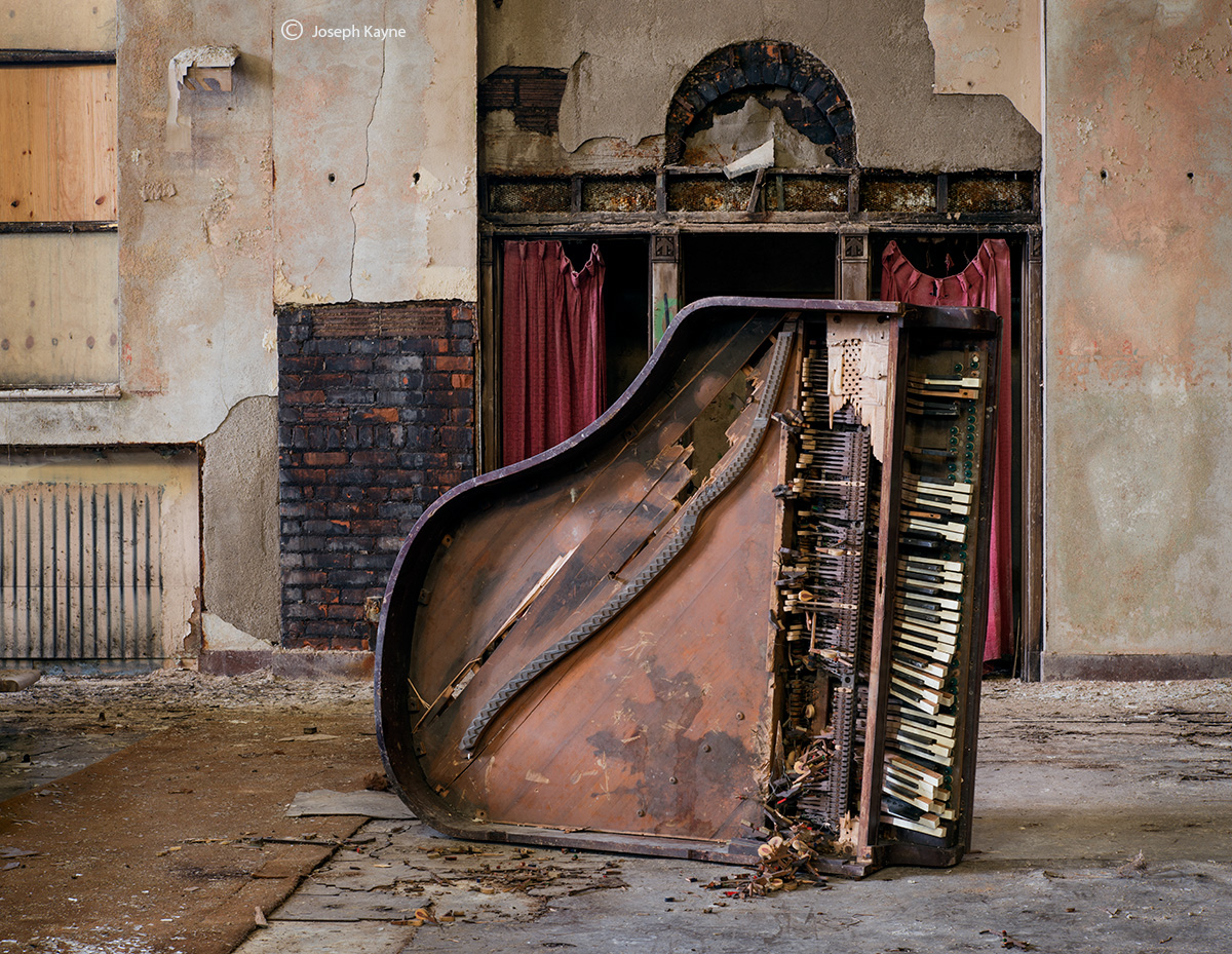 Upended Piano In An Abandoned Church