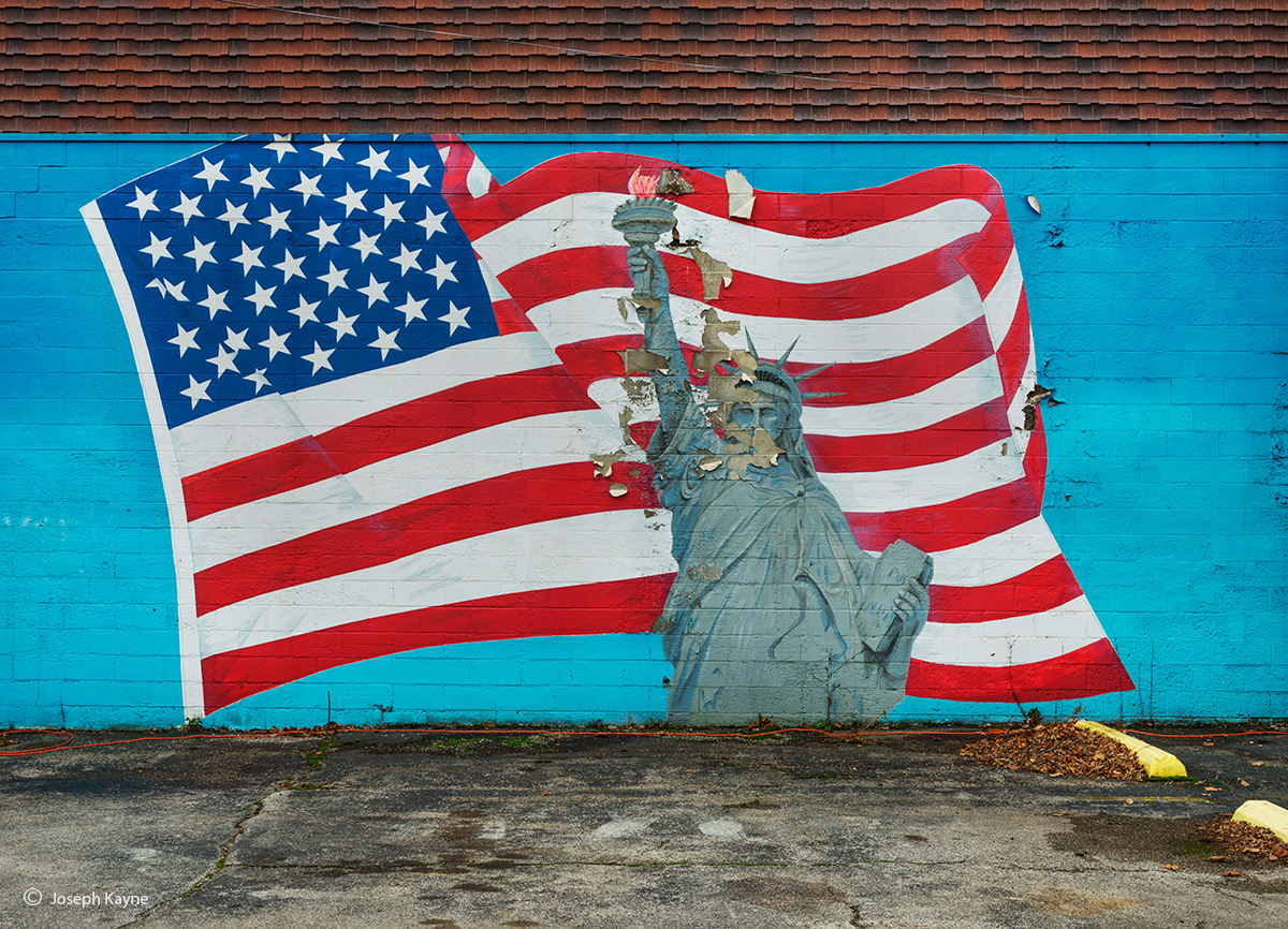 Fading Statute of Liberty Mural