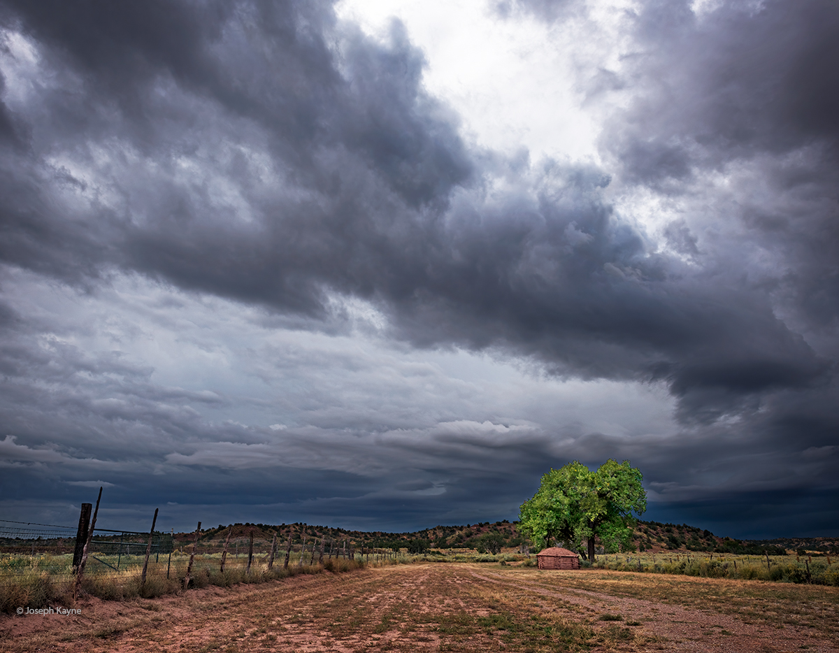 Incoming Storm Over A Navajo Hogan